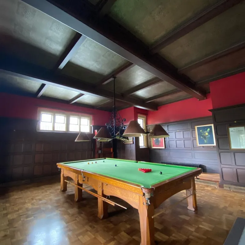Panelled billiard room after